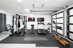 Climate controlled gym located in garage